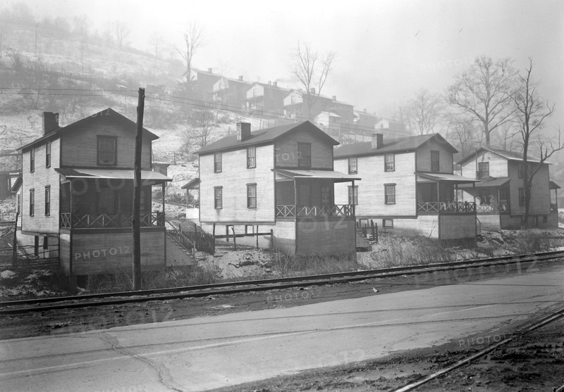 Scott's Run, West Virginia. Pursglove Mines Nos. 4 and 5 - Scene taken from main highway shows typical hillside settlements. Houses shown are for supervisory staff. Camp one of the best on Scott's Run, March 1937, Lewis Hine, 1874 - 1940, was an American photographer, who used his camera as a tool for social reform. US,USA