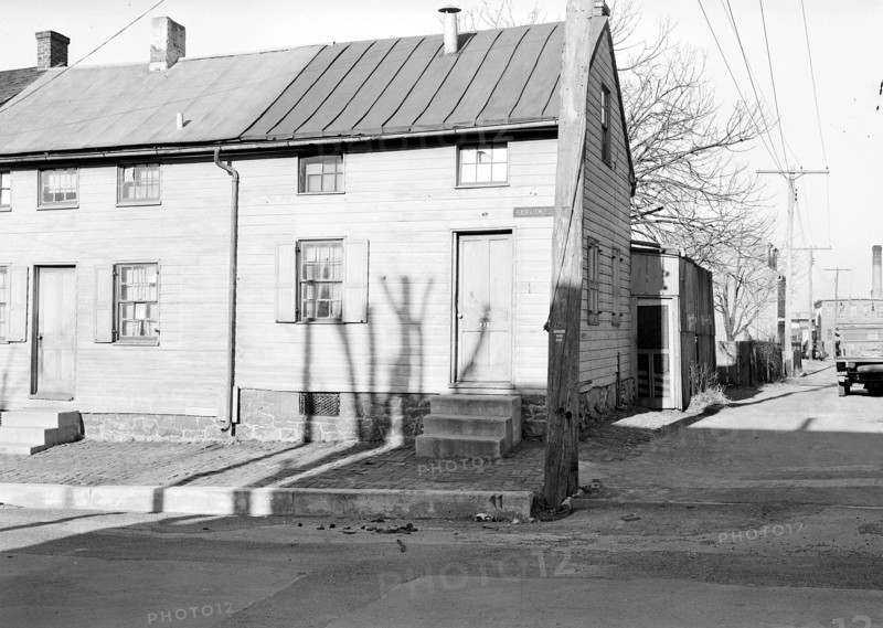 Lancaster, Pennsylvania - Housing. Low-priced houses on Cabbage Hill - rental about $12.00 per month - (umbrella factory in distance), 1936, Lewis Hine, 1874 - 1940, was an American photographer, who used his camera as a tool for social reform. US,USA