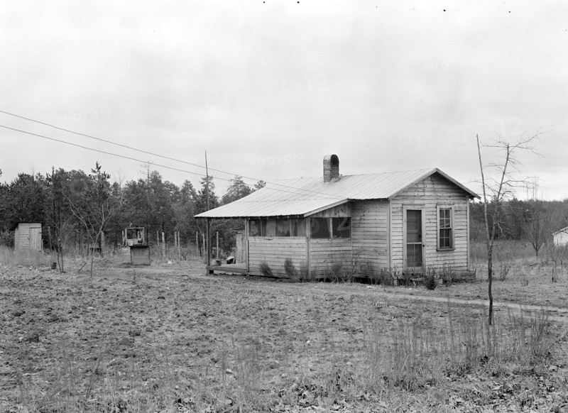 High Point, North Carolina - Housing. Homes of skilled furniture workers in Tomlinson Chair Mfg. Company, High Point, North Carolina. They have bought a small parcel of land, just outside the city limits, and put up a small cottage themselves. This seems to be popular, 1936, Lewis Hine, 1874 - 1940, was an American photographer, who used his camera as a tool for social reform. US,USA