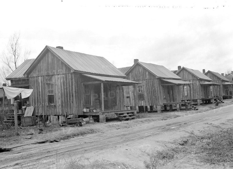 High Point, North Carolina - Housing. Row of hovels occupied by colored workers from furniture and cotton mills - High Point, North Carolina, 1936, Lewis Hine, 1874 - 1940, was an American photographer, who used his camera as a tool for social reform. US,USA