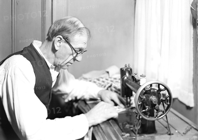 Paterson, New Jersey - Textiles. An old silk-worker (now unable to work) living on earnings of a roomer, March 1937, Lewis Hine, 1874 - 1940, was an American photographer, who used his camera as a tool for social reform. US,USA