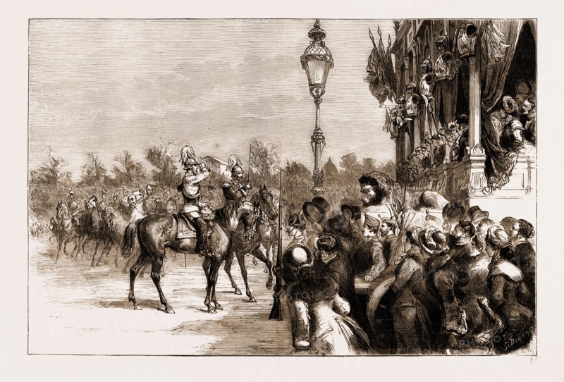 THE VISIT OF THE CROWN PRINCE OF GERMANY TO SPAIN: THE CROWN PRINCE SALUTING THE LADIES OF THE ROYAL FAMILY AT THE MILITARY REVIEW, MADRID, NOV. 24, 1883