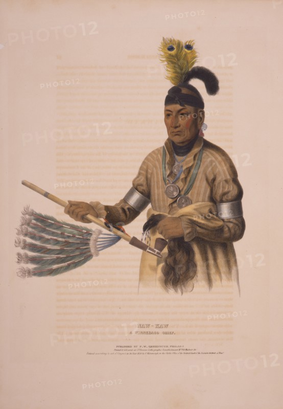 Naw-kaw, a Winnebago chief / drawn, printed & coloured at I.T. Bowen's Lithographic Establishment, no. 94 Walnut St.; Philadelphia : F. W. Greenough, c1836.; 1 print : lithograph, hand-colored.; Print shows Naw-Kaw, a Winnebago chief, three-quarter length portrait holding a peace pipe(?).