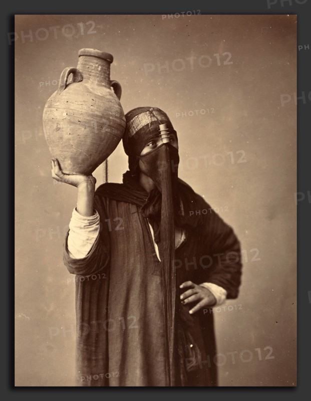 Félix Bonfils (French, 1831 - 1885), Porteuse d'eau au Caire [Water Carrier in Cairo], c. 1870, albumen print from collodion negative