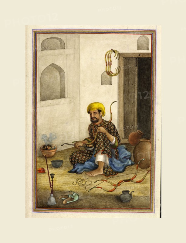 Tashrih al-aqvam, a bowmaker. Shown bending the wood of a bow over a bowl of embers, Occupational sub-division of Tarkhan caste, bowmakers. Tashrih al-aqvam