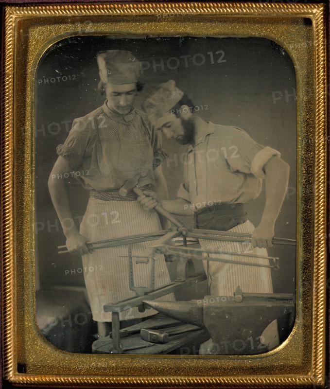 [Portrait of Two Metalworkers]