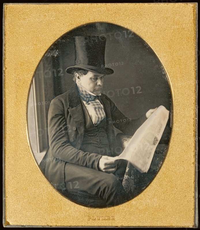 Portrait of a Man Reading a Newspaper