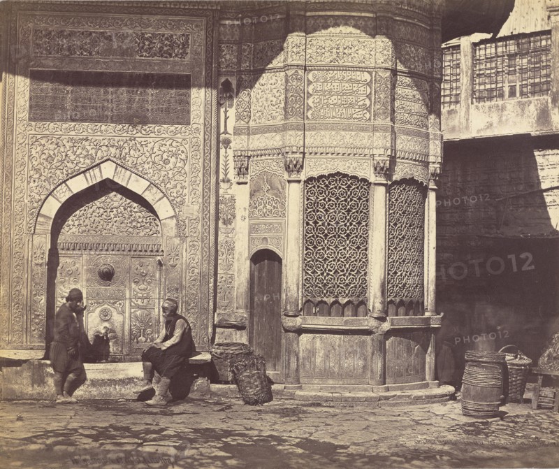 The Ancient Fountain by The Old Bridge