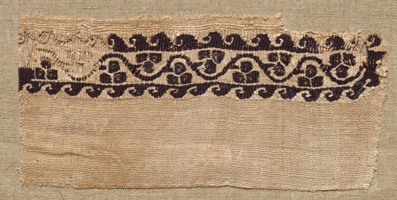 Fragment, with Part of a Clavus, from a Tunic, 400s - 500s. Egypt, Byzantine period, 5th - 6th century. Tabby with inwoven tapestry ornament, wool and linen on linen ground; overall: 8.9 x 18.8 cm (3 1/2 x 7 3/8 in.)