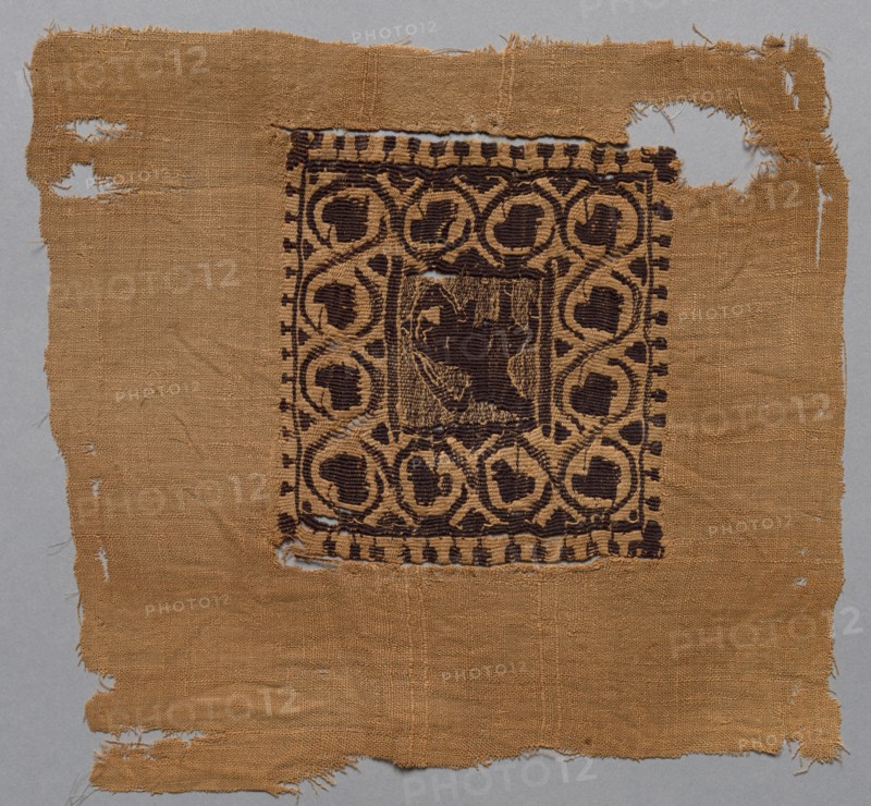 Fragment, with Segmentum, from a Tunic, 500s. Egypt, Byzantine period, 6th century. Tabby weave, inwoven tapestry ornament; wool and linen; overall: 23.5 x 22.3 cm (9 1/4 x 8 3/4 in.).