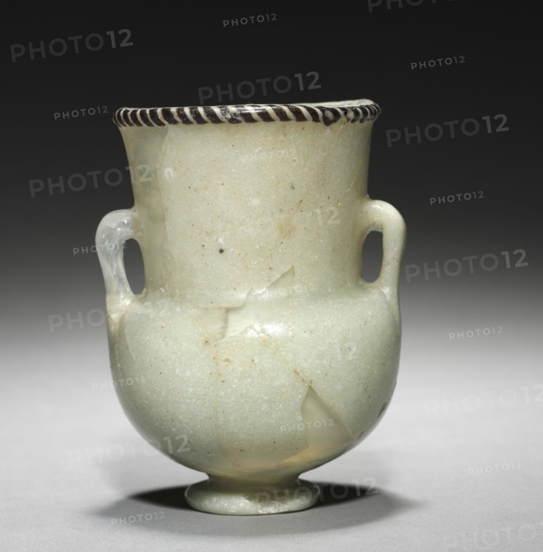 Unguent Bottle (Krateriskos), c. 1336-1295 BC. Egypt, New Kingdom, Late Dynasty 18 (1540-1296 BC). (post-Amarna period or later). Glass; diameter: 8.1 cm (3 3/16 in.); diameter of mouth: 7.1 cm (2 13/16 in.); overall: 11 cm (4 5/16 in.).