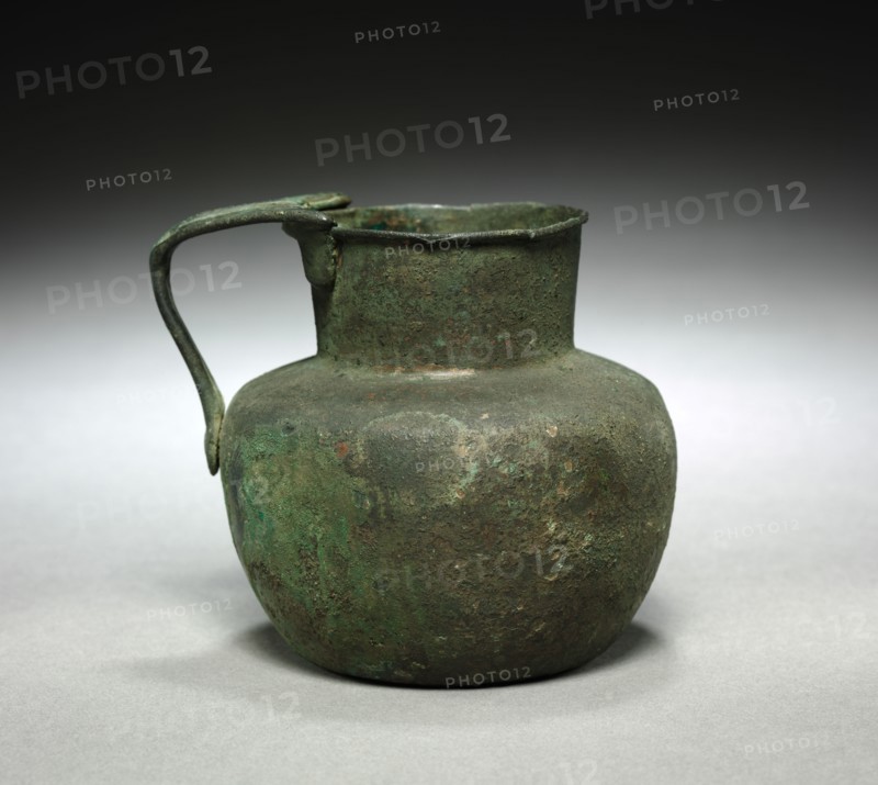 Jug or Pitcher, 1350-1186BC. Egypt, New Kingdom, late Dynasty 18 (1540-1296 BC) to Dynasty 19 (1295-1186 BC). Bronze; diameter: 9.6 cm (3 3/4 in.); diameter of mouth: 6.1 cm (2 3/8 in.); overall: 9.2 cm (3 5/8 in.).