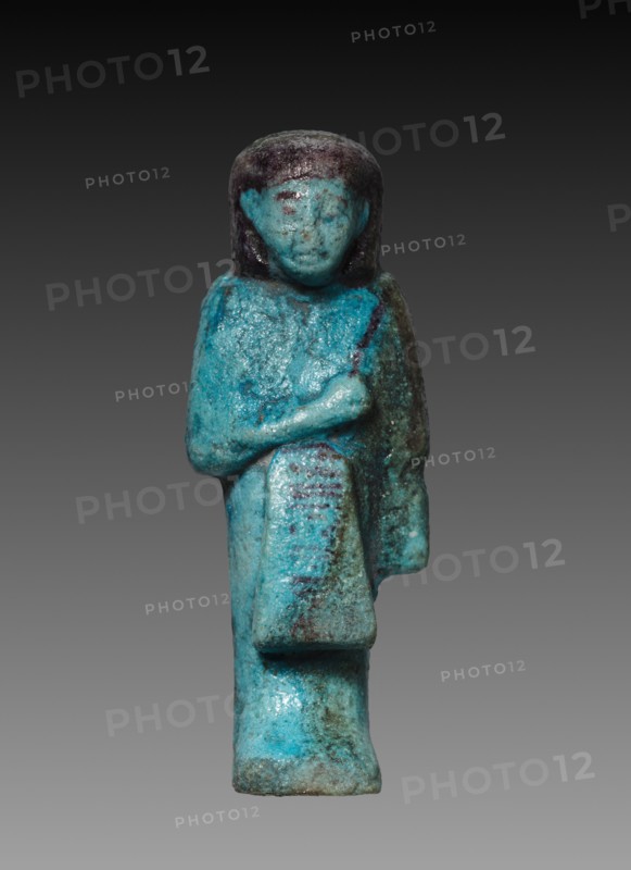 Overseer Shawabty, 1069-945 BC. Egypt, Third Intermediate Period, probably late Dynasty 21. Turquoise faience with dark purple decoration; overall: 10.8 x 4.2 x 2.8 cm (4 1/4 x 1 5/8 x 1 1/8 in.).