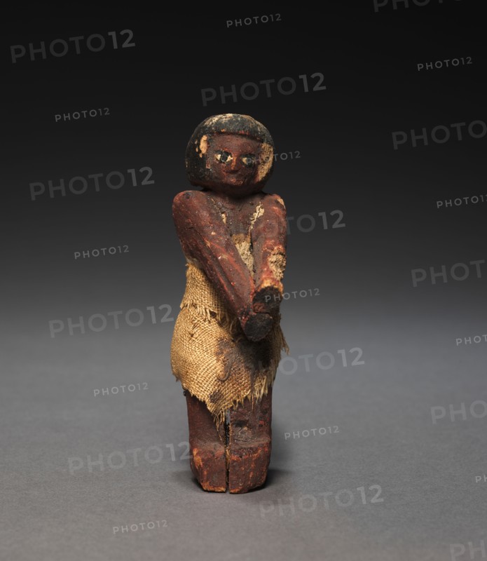 Seated Model Sailor, c. 2000-1000 BC. Egypt, Middle Kingdom, late Dynasty 11 (2040-1980 BC) to early Dynasty 12 (1980-1951 BC). Painted sycamore fig; average: 11 cm (4 5/16 in.).