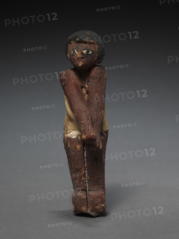 Seated Model Sailor, c. 2000-1000 BC. Egypt, Middle Kingdom, late Dynasty 11 (2040-1980 BC) to early Dynasty 12 (1980-1951 BC). Painted sycamore fig; average: 11 cm (4 5/16 in.).