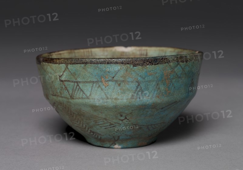 Decorated Bowl, 1980-1801 BC. Egypt, Late Middle Kingdom to early New Kingdom. Turquoise faience with black painted decoration; diameter: 10.8 cm (4 1/4 in.); overall: 6.2 cm (2 7/16 in.).