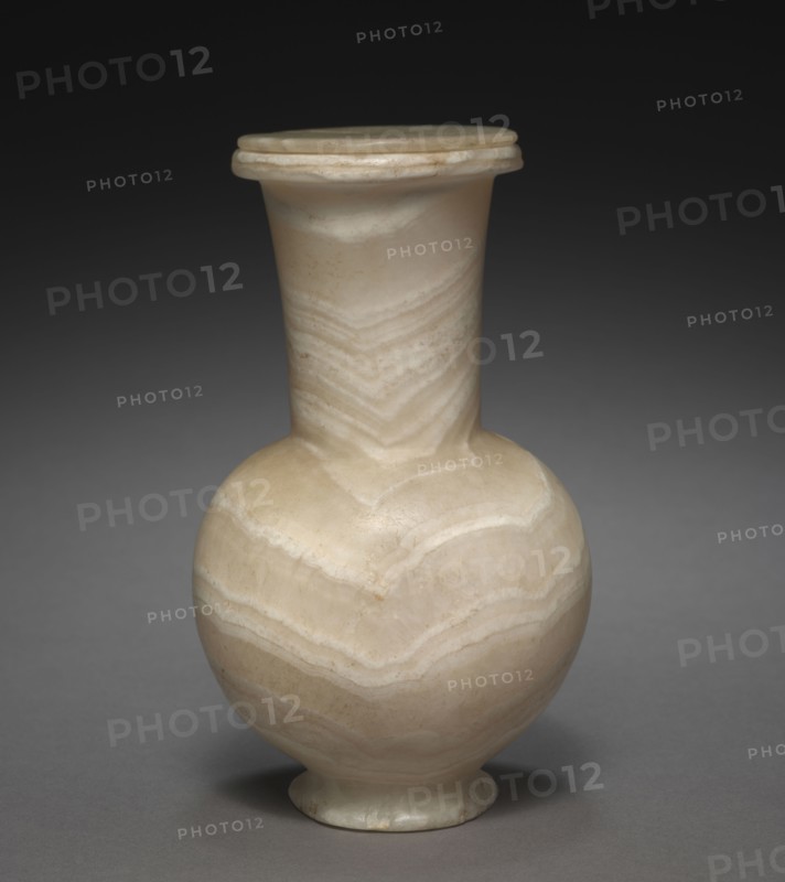 Long-Necked Flask with Lid, 1401-1353 BC. Egypt, New Kingdom, Dynasty 18,  reign of Tuthmosis III, to reign of Amenhotep III, 1479-1353 BC. Travertine; diameter: 9.7 cm (3 13/16 in.); diameter of mouth: 4.5 cm (1 3/4 in.); overall: 16.4 cm (6 7/16 in.); diameter of lid: 6.6 cm (2 5/8 in.).