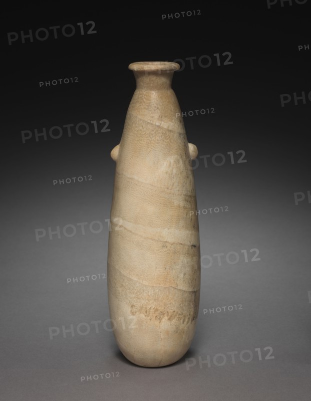 Alabastron, 664-525 BC. Egypt, Late Period, Dynasty 26 or later. Travertine; diameter: 8 cm (3 1/8 in.); diameter of mouth: 2.1 cm (13/16 in.); overall: 25.4 cm (10 in.).