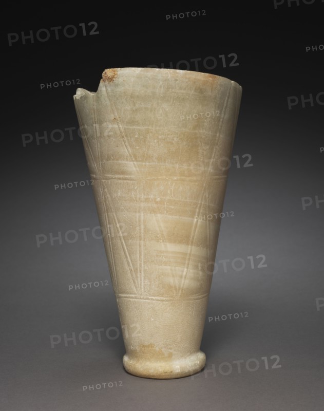 Tall Jar with Rope Patterns, 2647-2454 BC. Egypt, Saqqara, north of the Step Pyramid, tomb 2305, excavations of J. E. Quibell, 1910-1911, Predynastic-Old Kingdom, Dynasty 3, reign of Djoser, to Dynasty 4, reign of Sneferu, 2628-2549 BC. Travertine; diameter: 13.1 cm (5 3/16 in.); overall: 23.7 cm (9 5/16 in.).