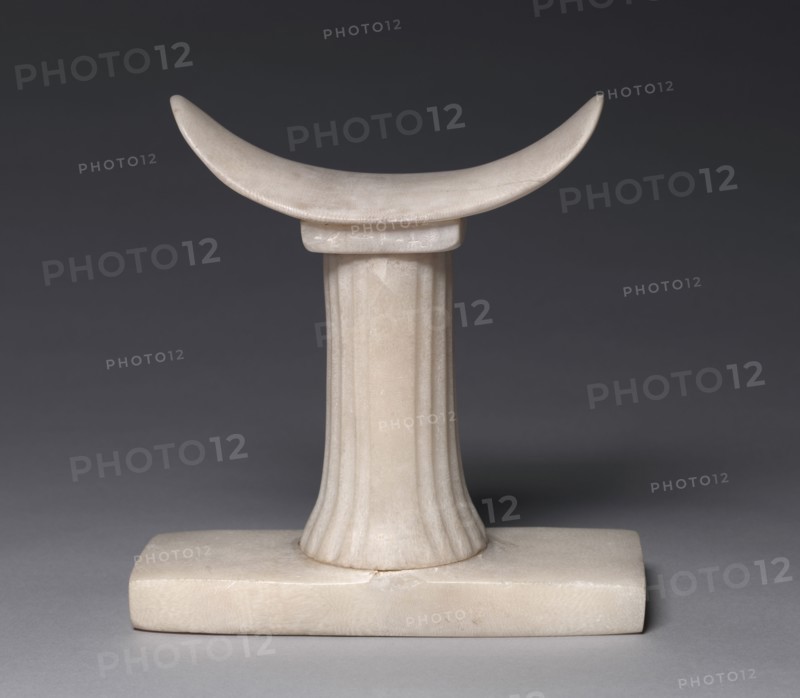 Headrest of Irut, c. 2454-2140 BC. Egypt, Old Kingdom, Dynasties 5-6, 2454-2140 BC. Travertine; overall: 19.5 x 18.8 x 7.4 cm (7 11/16 x 7 3/8 x 2 15/16 in.).