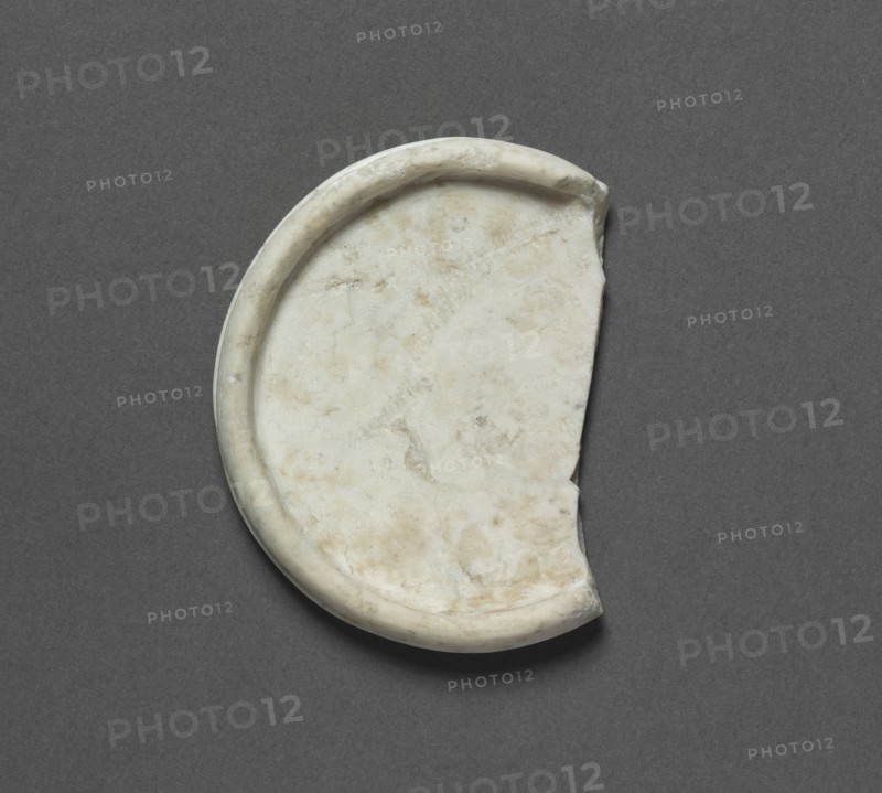 Cosmetic Vessel, 2770-2573 BC. Egypt, Saqqara, north of the Step Pyramid, tomb 2331, excavations of J. E. Quibell, 1910-1911, Predynastic, Dynasty 2-3, 2770-2573 BC. Limestone; diameter: 5.3 cm (2 1/16 in.); overall: 1 cm (3/8 in.).