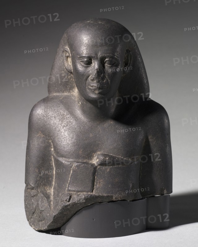 Bust of Ankh-Hor, 525-404 BC. Egypt, Late Period, Dynasty 27. Basalt; overall: 21.5 x 15 cm (8 7/16 x 5 7/8 in.).