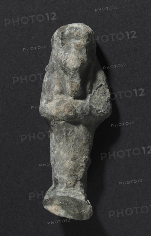 Shawabty of Ditamenpaankh, 715-656 BC. Egypt, Late Period, Dynasty 25. Terracotta; overall: 6.2 x 2.5 x 1.7 cm (2 7/16 x 1 x 11/16 in.).