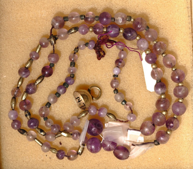 String of Beads, 2040-1648 BC. Egypt, Middle Kingdom. Amethyst and gold; overall: 29.2 cm (11 1/2 in.).