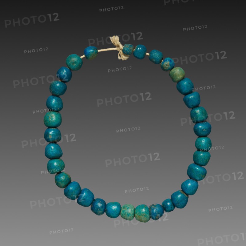 String of Beads, 1980-1801 BC. Egypt, Middle Kingdom. Blue faience; overall: 10.4 cm (4 1/8 in.).