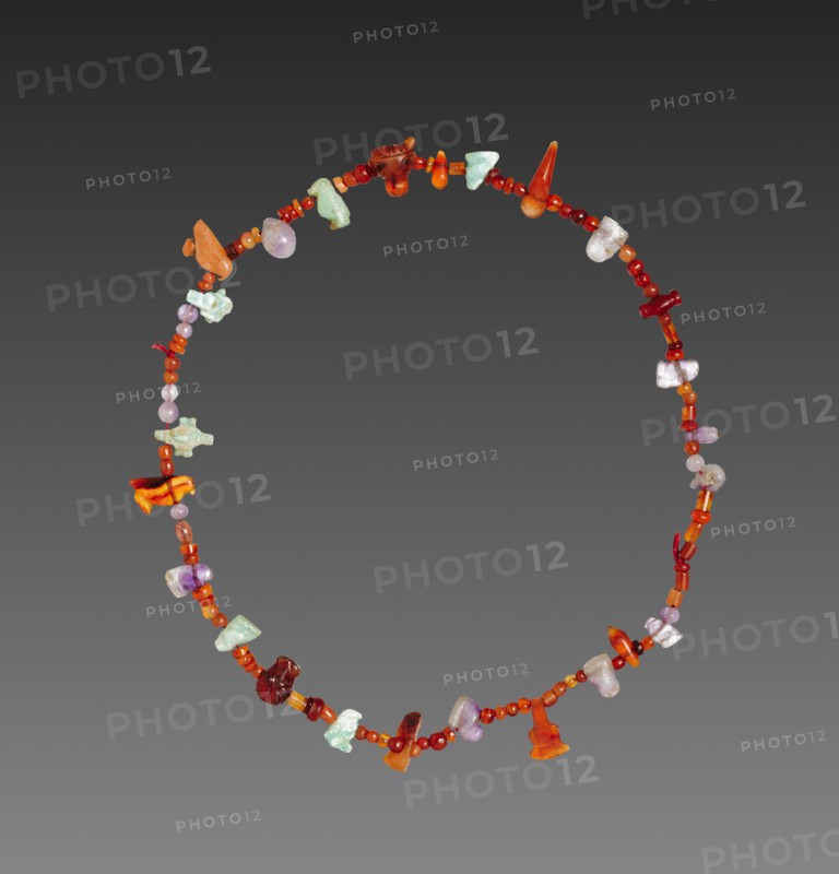 Necklace of Amulets, 1980-1801 BC. Egypt, Middle Kingdom, mostly Dynasty 12. Carnelian, feldspar, and amethyst; overall: 19.5 cm (7 11/16 in.).