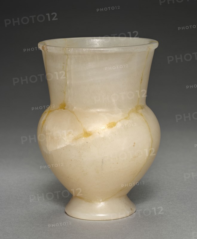 Long-Necked Flask (Krateriskos), 1540-1296 BC. Egypt, New Kingdom, Dynasty 18, reign of Tuthmosis III to Amenhotep III. Travertine; diameter: 7.5 cm (2 15/16 in.); overall: 10.9 cm (4 5/16 in.).