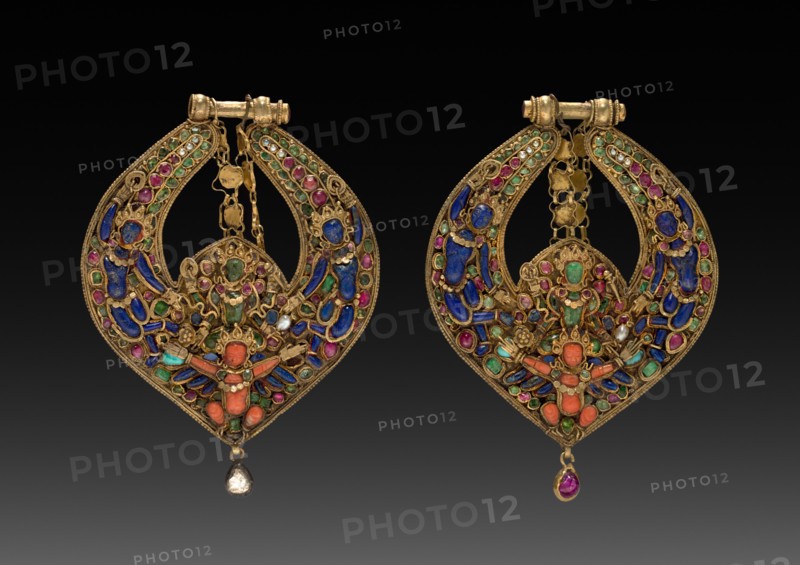 Pair of Deity Earrings with Vishnu on Garuda (front) and chepu (monster mask) (back), 1600s or 1700s. Nepal, Kathmandu Valley. Gold set with precious and semi-precious stones; 9.5 x 6.9 cm (3 3/4 x 2 11/16 in.).