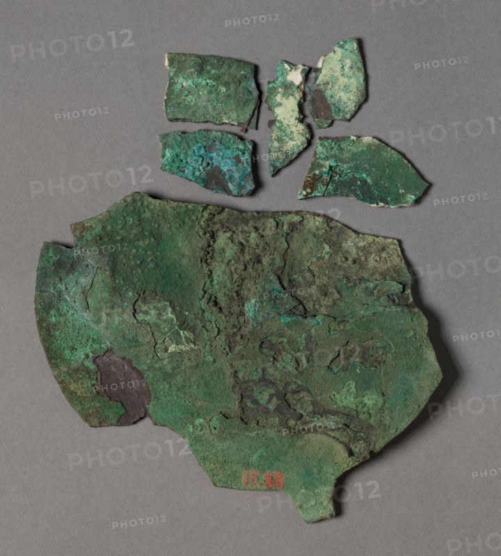 Fragment of a Mirror Disk, 2040-1648 BC. Egypt, Middle Kingdom. Bronze; overall: 8.9 cm (3 1/2 in.); with tang: 10.7 cm (4 3/16 in.).