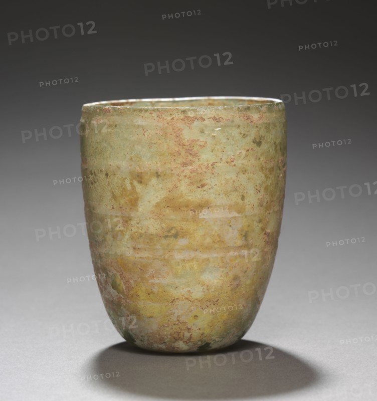 Cup, c. 300-400. Eastern Mediterranean, Roman, probably 4th century. Glass; diameter: 6.9 cm (2 11/16 in.); overall: 8.5 x 7.1 cm (3 3/8 x 2 13/16 in.).