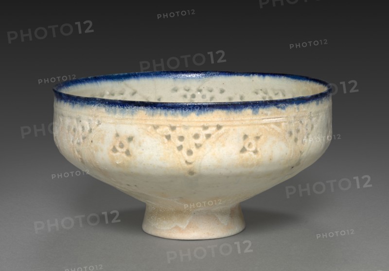 Footed Bowl, late 1100s-early 1200s. Iran, probably Kashan, Seljuq period, late 12-early 13th century. Fritware, pierced and underglaze painting; overall: 9.8 x 18.2 cm (3 7/8 x 7 3/16 in.).
