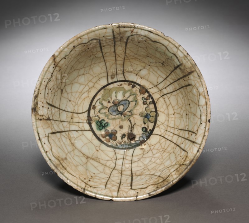 Bowl, early 17th Century. Iran, Safavid Period. Fritware with underglaze painted design in colored slips ("Kubachi" ware); overall: 27 x 10.6 cm (10 5/8 x 4 3/16 in.).