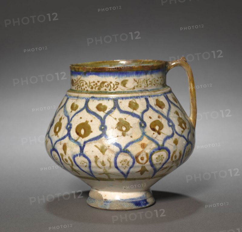 Jug, 1170-1220. Iran, Kashan, Seljuk Period. Fritware with luster-painted design; overall: 14.7 x 17 cm (5 13/16 x 6 11/16 in.).