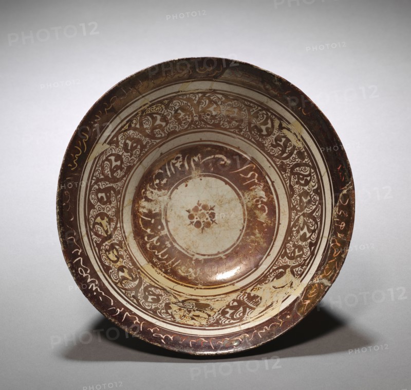 Bowl, early 13th Century. Iran, Kashan, Seljuk Period. Fritware with luster-painted design; overall: 9.8 x 21.5 cm (3 7/8 x 8 7/16 in.).