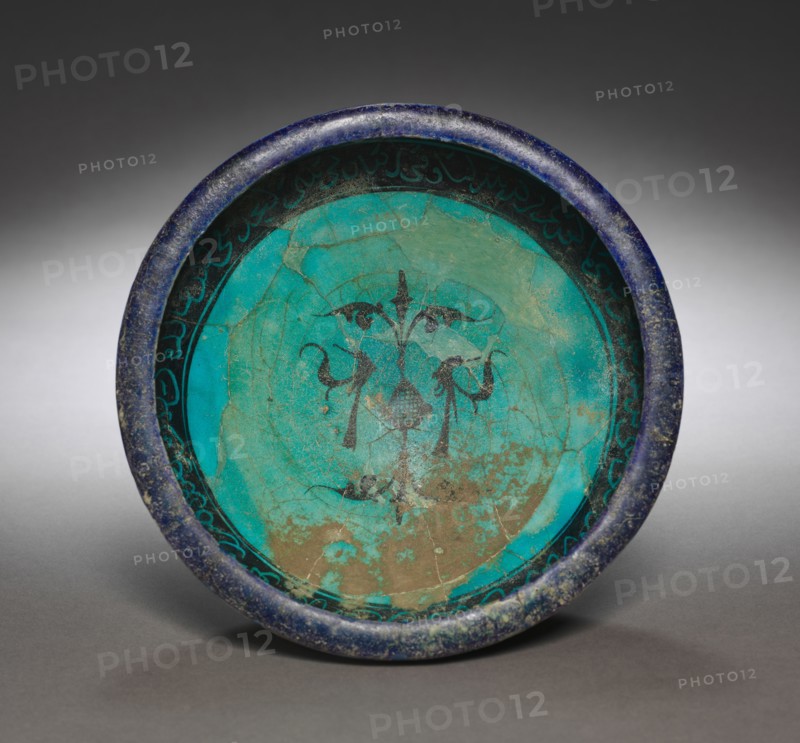 Bowl, early 13th Century. Iran, Kashan, Seljuk Period. Earthenware with underglaze-painted and incised design; overall: 9.5 x 20.7 cm (3 3/4 x 8 1/8 in.).