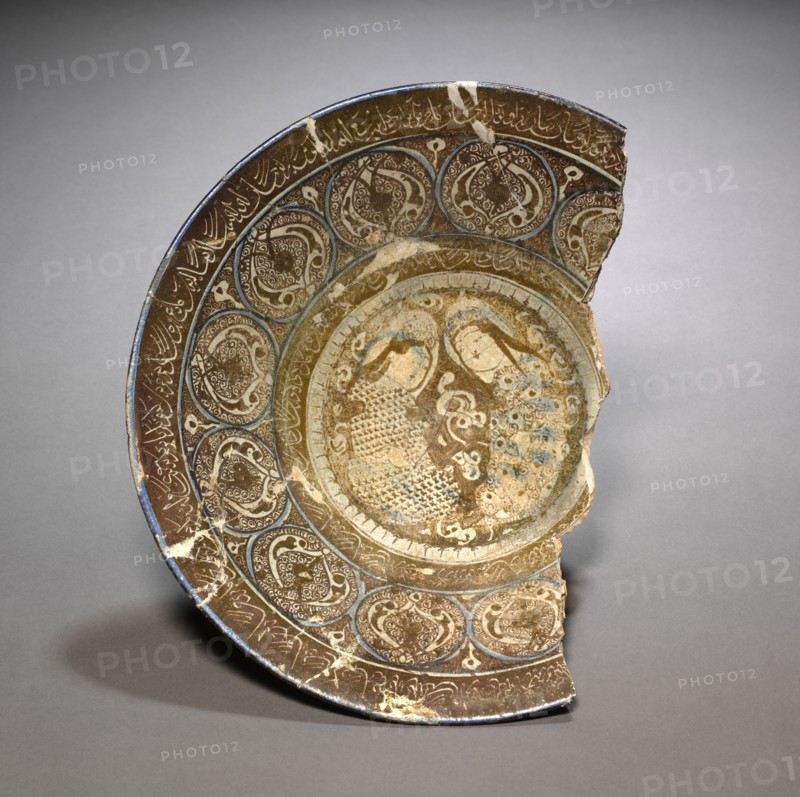 Plate, 13th Century. Iran, Rayy or Raqqa (?), Seljuk Period. Fritware with luster-painted design; diameter: 32.4 cm (12 3/4 in.).