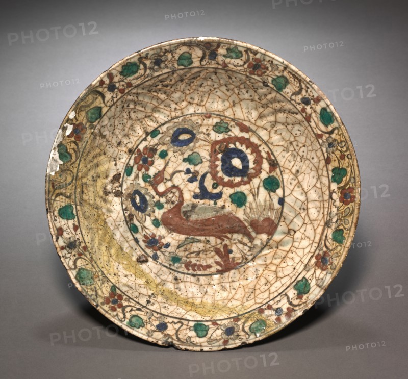 Bowl, early 17th Century. Iran, Safavid Period. Fritware with underglaze painted design in colored slips ("Kubachi" ware); overall: 8.4 x 35.6 cm (3 5/16 x 14 in.).