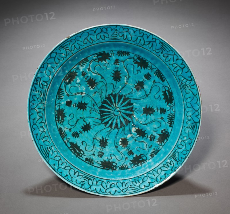 Dish, c. 1600. Caucasus or northern Iran. Fritware with underglaze-painted design in black slip ("Kubachi" ware); diameter: 34.2 cm (13 7/16 in.).