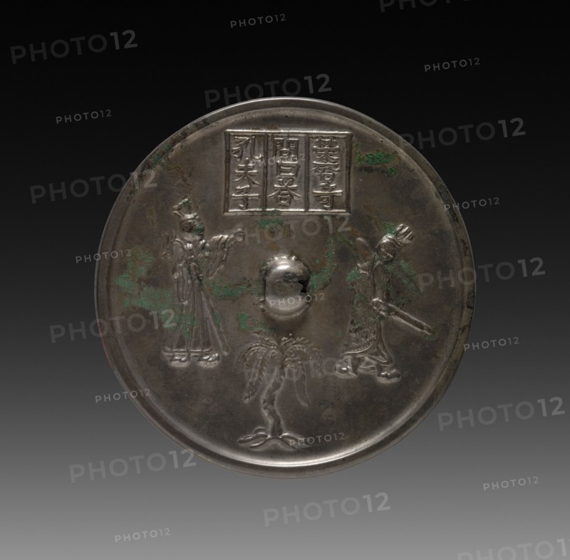 Mirror, 618-907. China, Tang dynasty (618-907). Bronze with silver inlay in lacquer; diameter: 11.8 cm (4 5/8 in.).