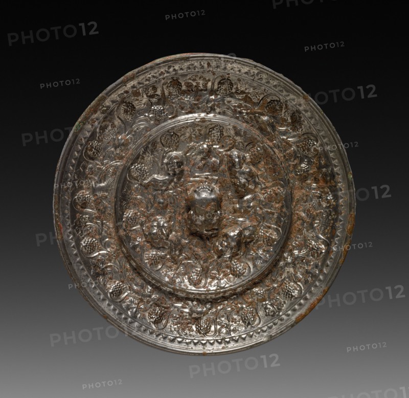 Mirror, 618-907. China, Tang dynasty (618-907). Bronze with silver inlay in lacquer; diameter: 11.8 cm (4 5/8 in.).