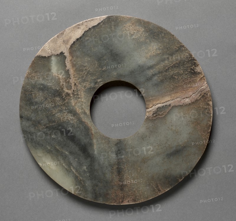 Perforated Disc (pi), 3000-2000 BC. China, Neolithic period (3rd-2nd millenium BC). Jade; diameter: 23.5 cm (9 1/4 in.); inner diameter: 7 cm (2 3/4 in.).