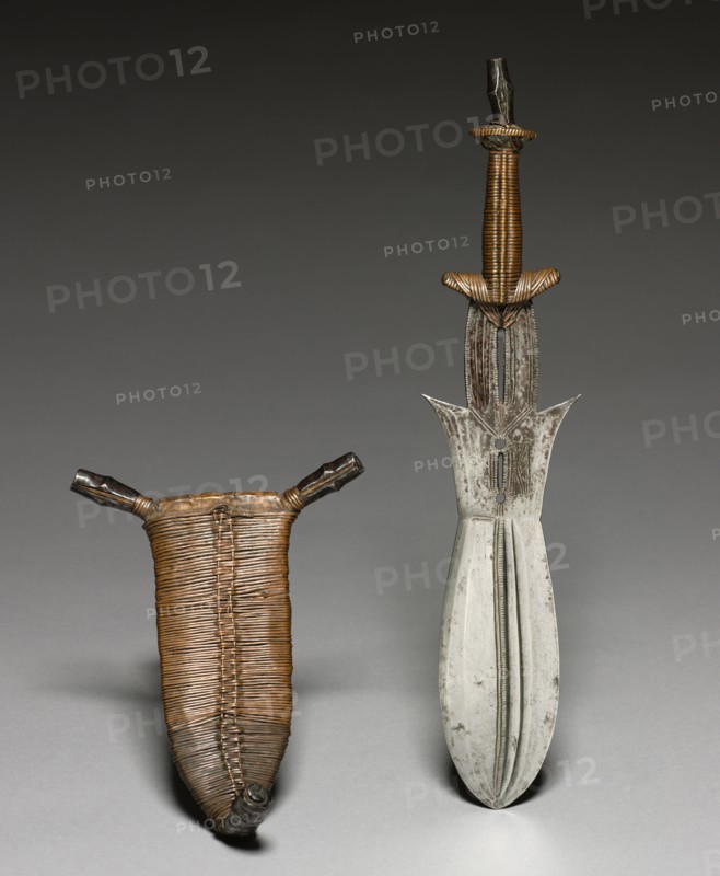 Knife, c. 1900. Africa, Democratic Republic of the Congo, Ngbandi, late 19th-early 20th century. Forged iron and copper; overall: 40.2 cm (15 13/16 in.); tang: 11.5 cm (4 1/2 in.); blade: 15.8 cm (6 1/4 in.)