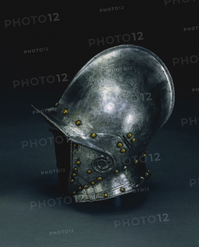 Burgonet with Hinged Cheek Pieces, c. 1560 - 1570. North Italy, 16th century. Steel with brass rivets, roped edges terminating in decorative spiral; fragments of leather liner; overall: 37 x 31.2 x 19.2 cm (14 9/16 x 12 5/16 x 7 9/16 in.).