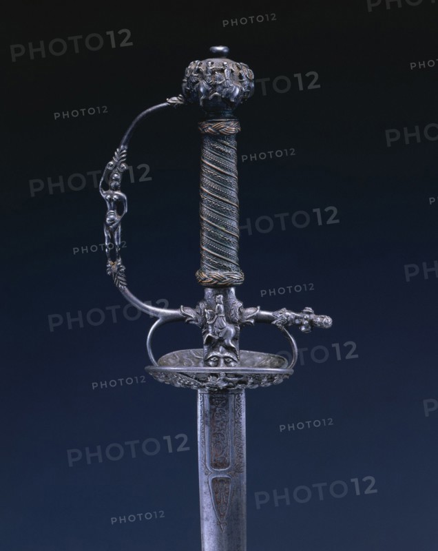 Small Sword, c.1650-1660. Netherlands, 17th century. Steel, wood, copper wire; chiseled hilt; engraved blade; overall: 95.3 cm (37 1/2 in.); blade: 78 cm (30 11/16 in.); grip: 11.8 cm (4 5/8 in.); guard: 8.3 cm (3 1/4 in.).