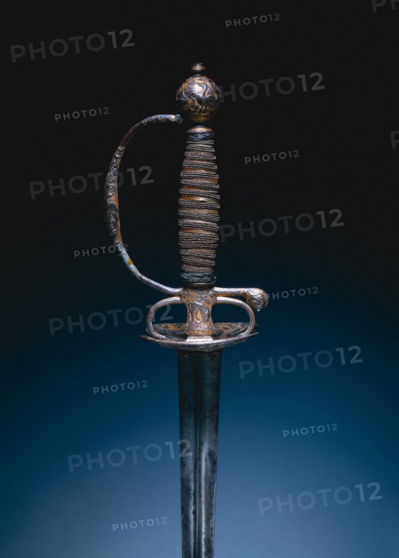 Small Sword, c.1750-1760. After a design by Jean-Baptiste Oudry (French, 1686-1755). Steel, gilt and russeted, copper, wood; overall: 105.4 cm (41 1/2 in.); blade: 87.9 cm (34 5/8 in.); guard: 7.9 cm (3 1/8 in.).