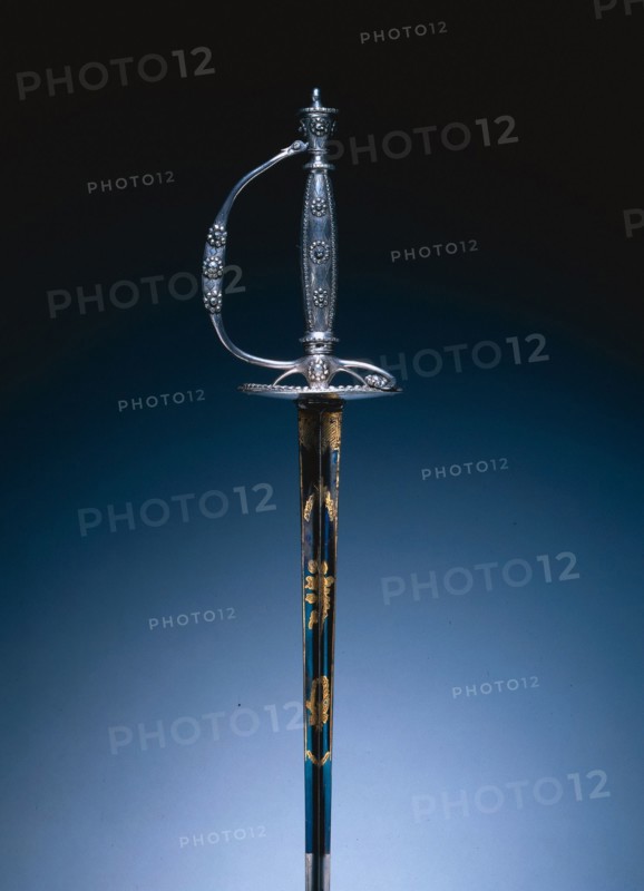 Court Sword, c. 1790. England, London or Birmingham, late 18th Century. Steel; silver hilt, polished and faceted; blade partially blued and gilded; overall: 99.7 cm (39 1/4 in.); blade: 82.9 cm (32 5/8 in.); guard: 8.3 cm (3 1/4 in.).